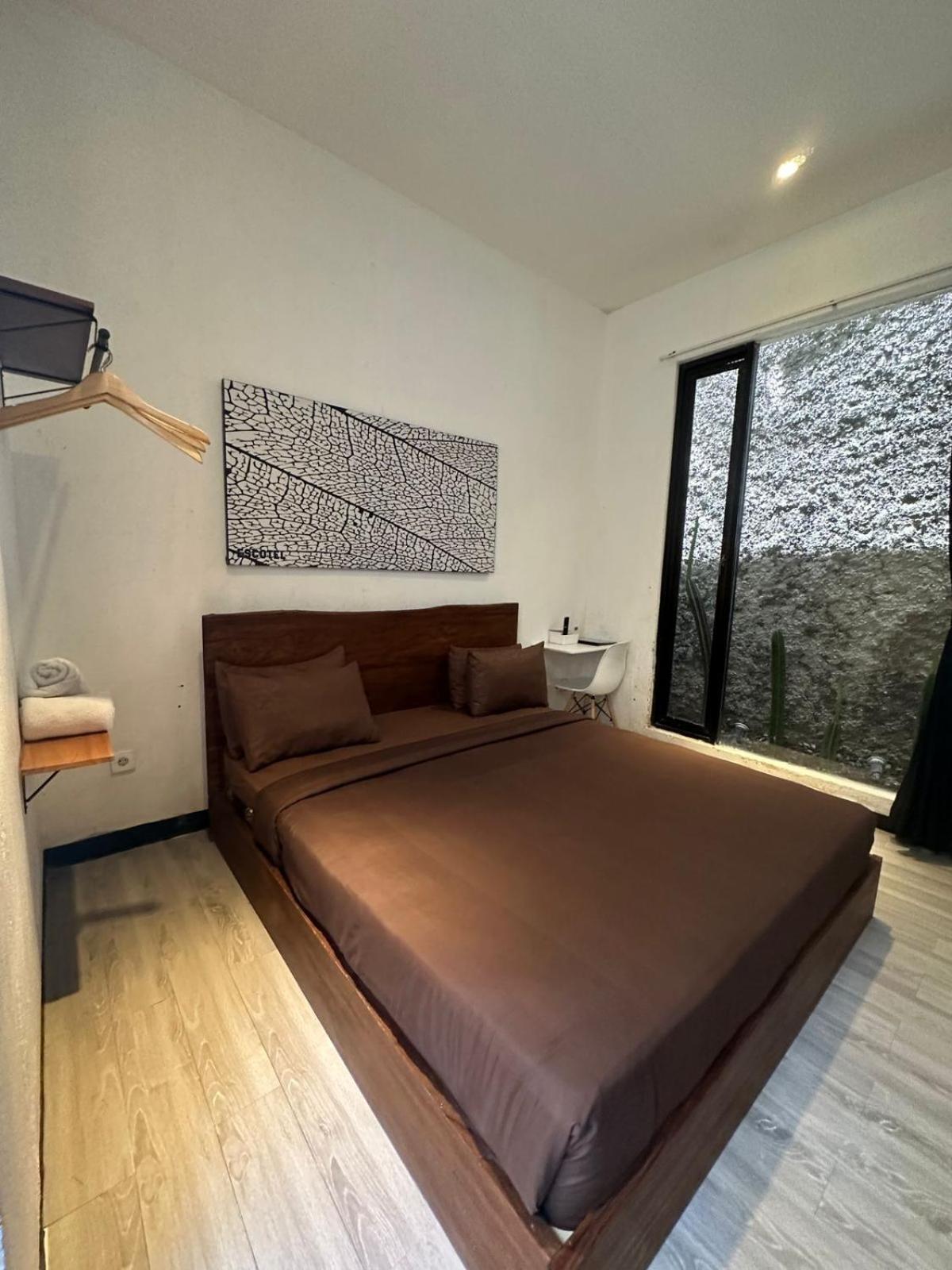 Escotel Tempekan Guest House Canggu Extérieur photo