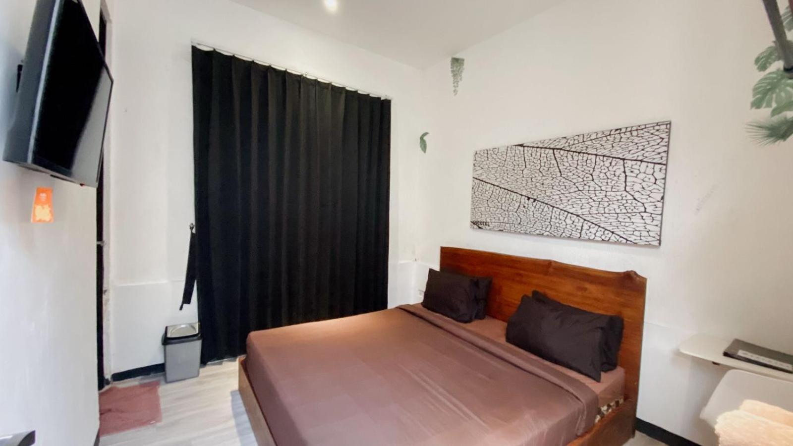 Escotel Tempekan Guest House Canggu Extérieur photo