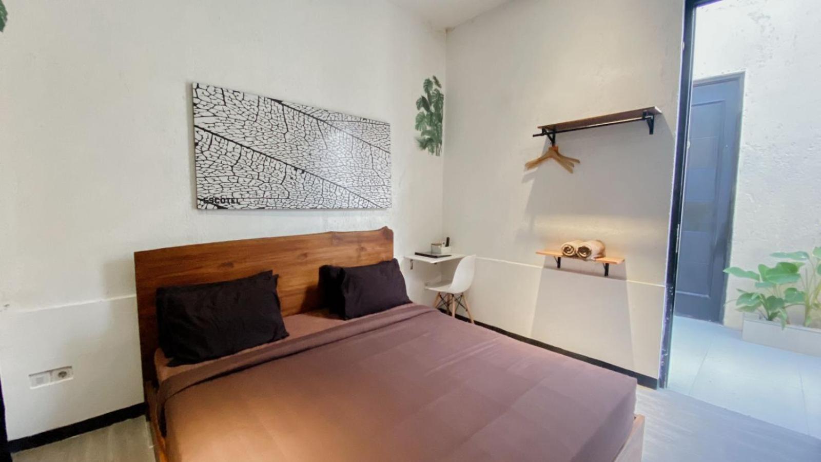 Escotel Tempekan Guest House Canggu Extérieur photo