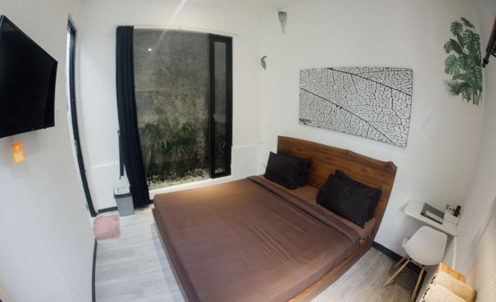 Escotel Tempekan Guest House Canggu Extérieur photo