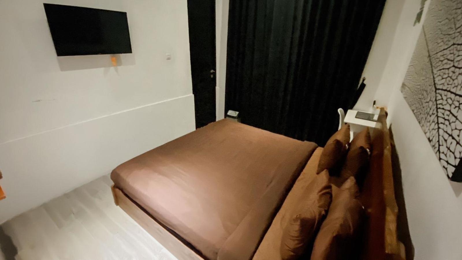 Escotel Tempekan Guest House Canggu Extérieur photo