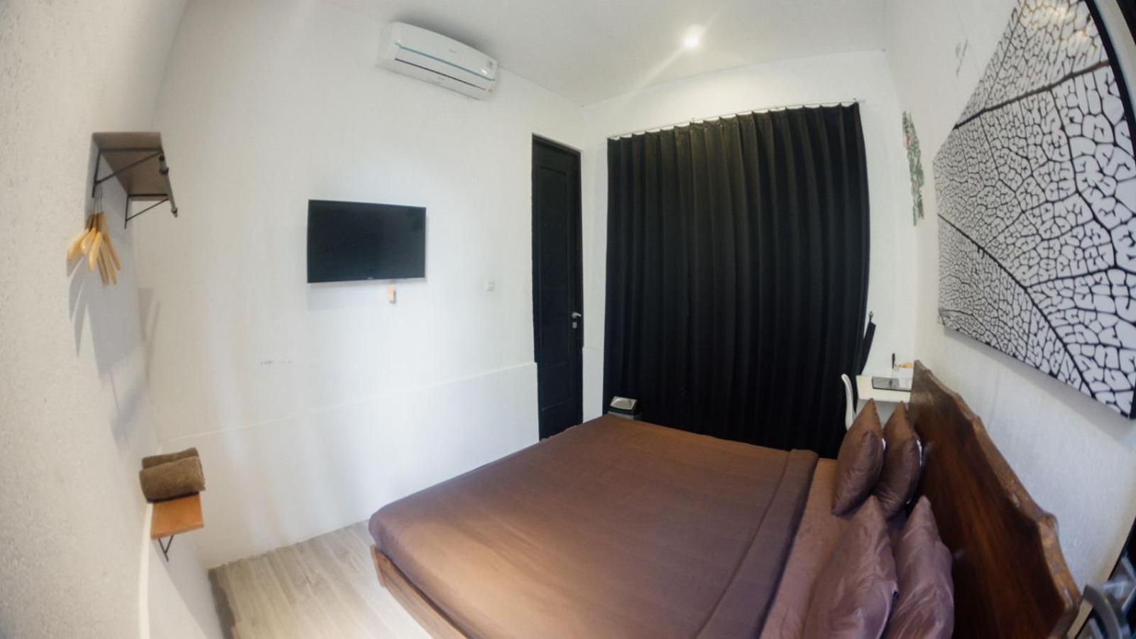 Escotel Tempekan Guest House Canggu Extérieur photo